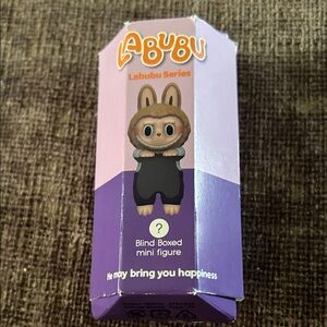 Series Blind Boxed Mini Figure - Purple and Black